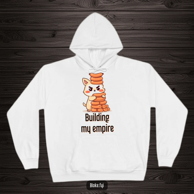 Funny hoodie with a determined bloke animal character building a tall tower of sausages, offering cozy and humorous wear.