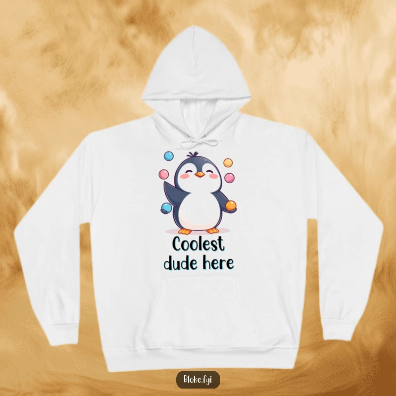 Funny Hoodie featuring a happy, pudgy penguin juggling items, perfect for cozy, humorous wear.