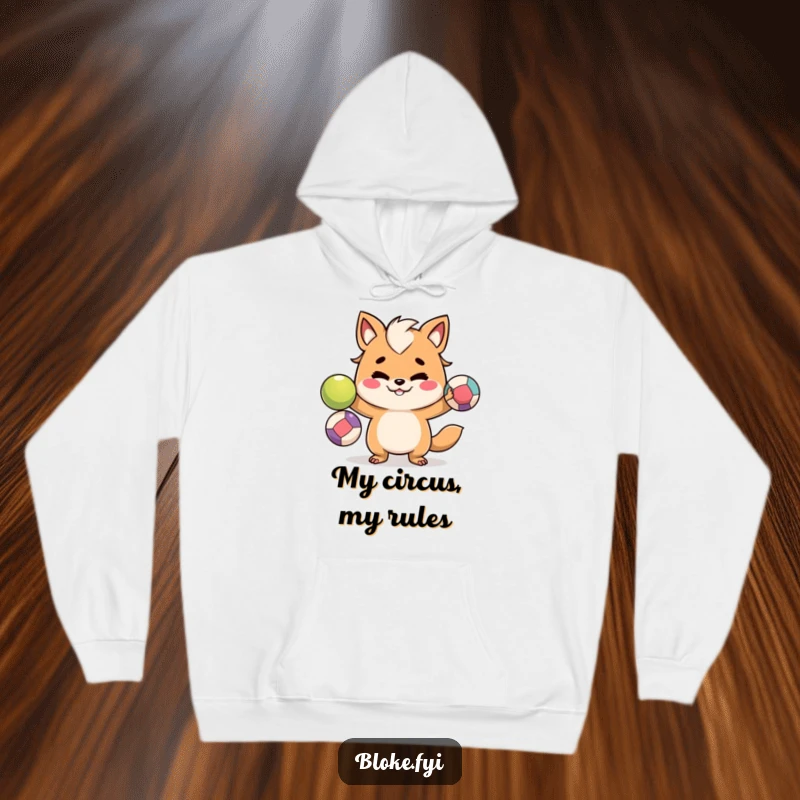 Funny hoodie featuring a mischievous bloke animal character juggling colorful balls, perfect for staying warm and stylish.